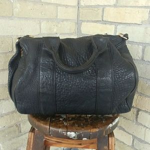 Black Leather Duffel Bag with Gold Studded Bottom
